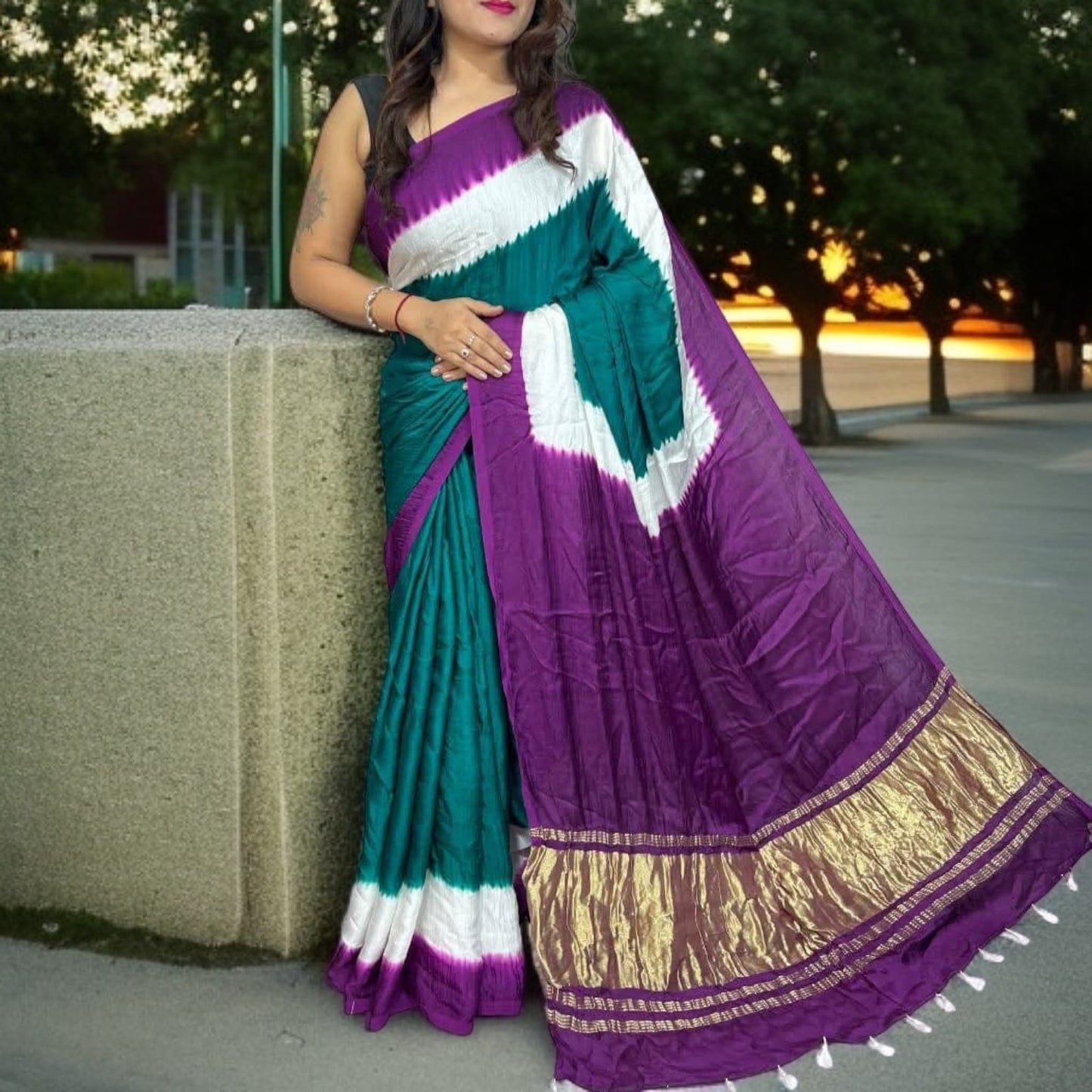 Modal silk designer saree with tussels