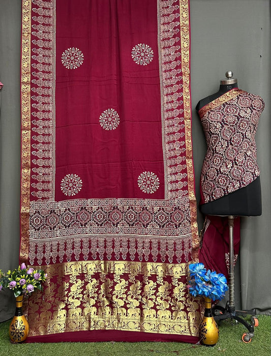 Ajrakh sarees with weaved zari