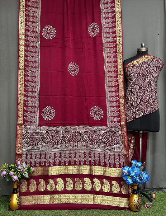 Ajrakh sarees with weaved zari