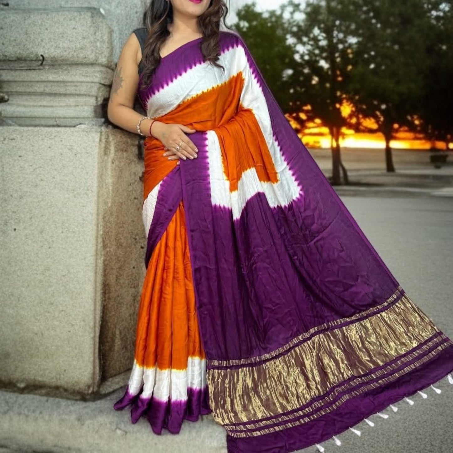 Modal silk designer saree with tussels